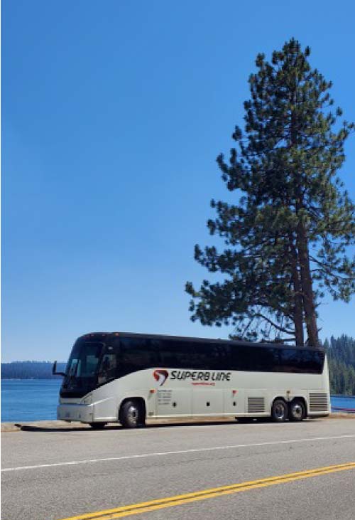 pacious charter bus, ready for a comfortable and enjoyable trip through clovis, California.